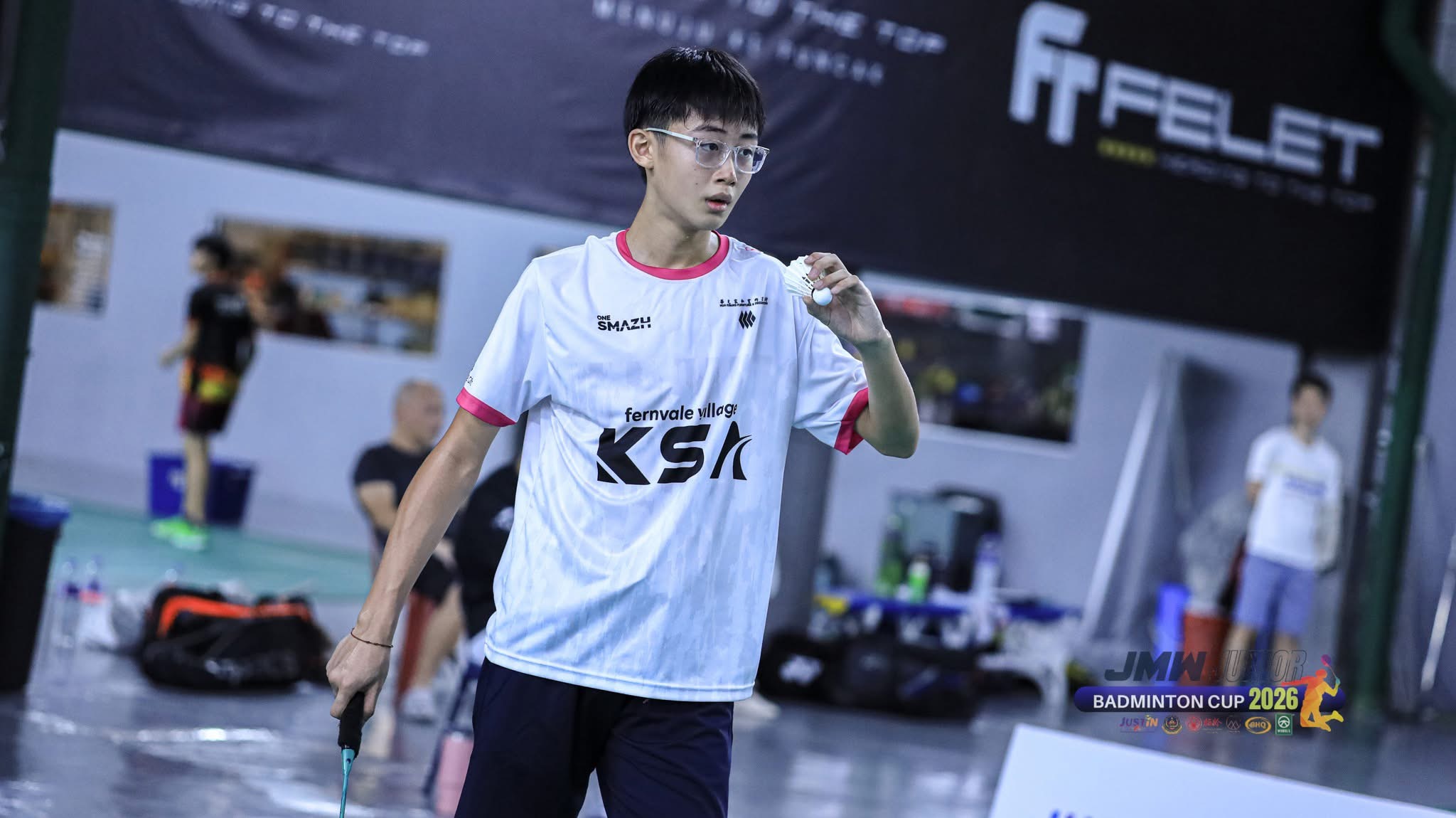 KSA intermediate player striking the shuttle at the JMW Junior Badminton Cup 2026